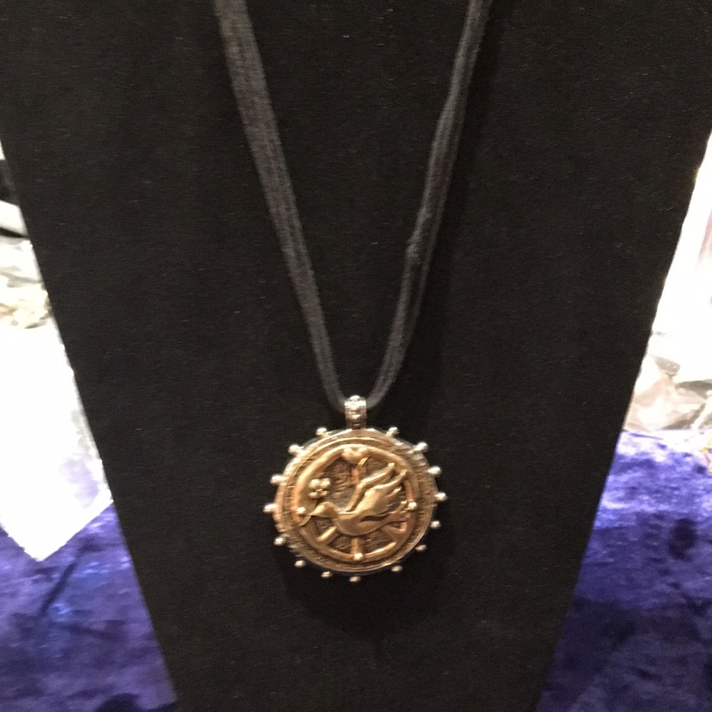 Black rope with silver pendant